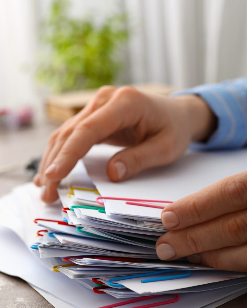 Concept of different office accessories - paper with clip